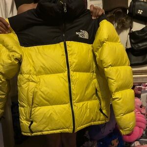 The North Face Yellow and Black Puffer Jacket